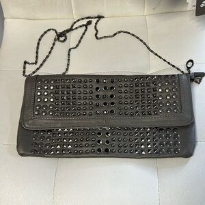 Dark gray, black studded purse with metal chain